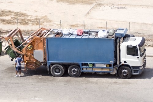 Inspector reviewing waste containers during an on-site investigation