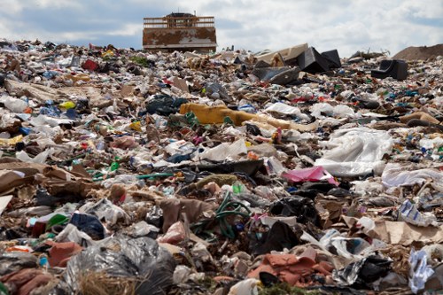 Waste clearance truck at a construction site